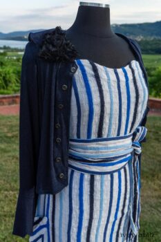 Harrison Frock in Hudson Blue Embroidered Stripe Voile; Porte Cochere Sash in Hudson Blue Embroidered Stripe Voile; Cilla Slip Frock in Peony Soft Ribbed Knit; Crest Jacket in Hudson Blue Soft Ribbed Knit; Soutache Brooch in Black Weaves. Ivey Abitz at Boscobel House and Gardens