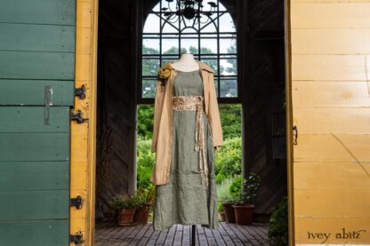 Porte Cochere Shirt Jacket in Yellow Days Washed Stripe Cotton; Porte Cochere Sash in Watercolour Silk Weave; Idyll Brooch in Yellow Days Weaves; Hudson Frock in Herb Garden Washed Linen. Ivey Abitz at Boscobel House and Gardens