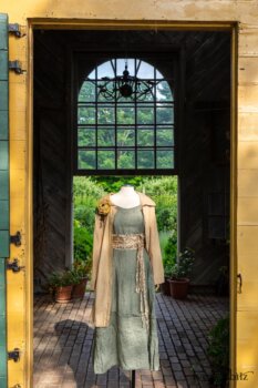 Porte Cochere Shirt Jacket in Yellow Days Washed Stripe Cotton; Porte Cochere Sash in Watercolour Silk Weave; Idyll Brooch in Yellow Days Weaves; Hudson Frock in Herb Garden Washed Linen. Ivey Abitz at Boscobel House and Gardens