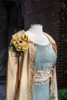 Porte Cochere Shirt Jacket in Yellow Days Washed Stripe Cotton; Porte Cochere Sash in Watercolour Silk Weave; Idyll Brooch in Yellow Days Weaves; Hudson Frock in Herb Garden Washed Linen. Ivey Abitz at Boscobel House and Gardens