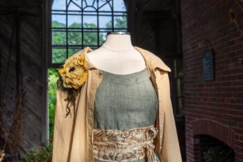 Porte Cochere Shirt Jacket in Yellow Days Washed Stripe Cotton; Porte Cochere Sash in Watercolour Silk Weave; Idyll Brooch in Yellow Days Weaves; Hudson Frock in Herb Garden Washed Linen. Ivey Abitz at Boscobel House and Gardens