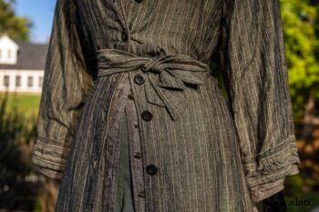 Gabled Duster Coat in Peace and Civility Stripe Linen; Gabled Shirt Jacket in Civility Washed Linen; Gabled Trousers in Civility Washed Stretch Weave; Clotaire Sash in Civility Garden Row Silk Chiffon. Location: Near the bridge and entrance to Stone Cottage and Val-Kill Cottage, the home of Eleanor Roosevelt. Eleanor Roosevelt National Historic Site, Hyde Park, New York.