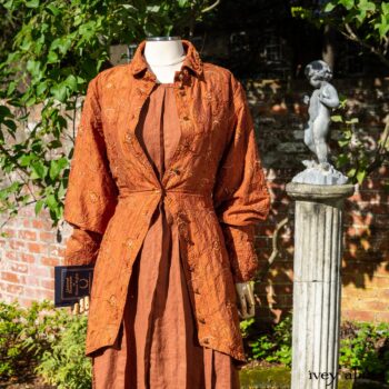 Truitt Shirt Jacket in Independence Embroidered Washed Silk; Eleanora Frock in Independence Washed Linen. Location: Inside the walled garden at the Eleanor Roosevelt National Historic Site. Val-Kill Cottage, Hyde Park, New York.