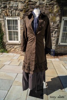 Hudson Duster Coat in Peace Soft Pinstripe Cotton; Hudson Frock in Civility Soft Check Twill; Porte Cochere Sash in Civility Floral Stretch Weave. Location: East profile of Stone Cottage. Eleanor Roosevelt National Historic Site. Val-Kill, Hyde Park, New York.