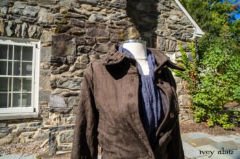 Hudson Duster Coat in Peace Soft Pinstripe Cotton; Hudson Frock in Civility Soft Check Twill; Porte Cochere Sash in Civility Floral Stretch Weave. Location: East profile of Stone Cottage. Eleanor Roosevelt National Historic Site. Val-Kill, Hyde Park, New York.