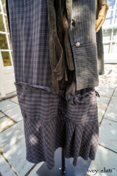 Gabled Duster Coat in Peace and Civility Stripe Linen; Gabled Shirt Jacket in Civility Washed Linen; Gabled Trousers in Civility Washed Stretch Weave. Location: Beside bridge that leads to Stone Cottage at Eleanor Roosevelt National Historic Site.