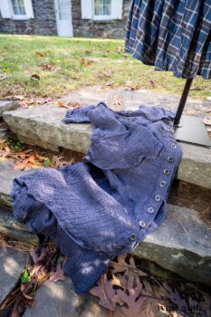 Crest Jacket in Liberty Soft Ribbed Knit; Crest Vest in Dignity Soft Check Twill; Heraldry Frock in Liberty Plaid Linen; Heraldry Duster Coat in Liberty Washed Crinkled Weave (draped on stone steps). Location: West profile of Stone Cottage. Eleanor Roosevelt National Historic Site. Val-Kill, Hyde Park, New York.