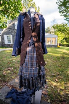 Crest Jacket in Liberty Soft Ribbed Knit; Crest Vest in Dignity Soft Check Twill; Heraldry Frock in Liberty Plaid Linen; Heraldry Duster Coat in Liberty Washed Crinkled Weave (draped on stone steps). Location: West profile of Stone Cottage. Eleanor Roosevelt National Historic Site. Val-Kill, Hyde Park, New York.