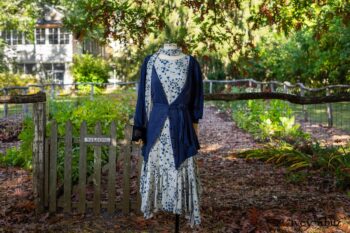 Fairholme Jacket in Liberty Lightweight Linen Knit; Fairholme Frock in Liberty Forget-Me-Not Weave; Blanchefleur Sash in Liberty Forget-Me-Not Weave. Location: Entrance to Eleanor's garden with her summer sleeping porch in the background. Eleanor Roosevelt National Historic Site. Val-Kill, Hyde Park, New York.