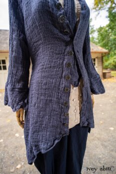 Heraldry Duster Coat in Washed Crinkled Weave; Crest Shirt in Respect Raised Pinstripe Weave; Fairholme Necktie Liberty Washed Crinkled Weave; Chevallier Trousers in Liberty and Unity Pinstripe Weave. Location: Stable at Val-Kill, Eleanor Roosevelt National Historic Site.