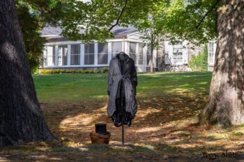 Scattergood Duster Coat in Unity Washed Linen; Scattergood Shirt Jacket in Unity Velvet Vine on Silk Chiffon; Scattergood Frock in Unity Floral Silk Velvet. Location: View of Stone Cottage from bridge at the Eleanor Roosevelt National Historic Site.