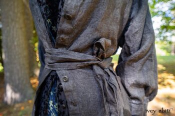 Scattergood Duster Coat in Unity Washed Linen; Scattergood Shirt Jacket in Unity Velvet Vine on Silk Chiffon; Scattergood Frock in Unity Floral Silk Velvet. Location: View of Stone Cottage from bridge at the Eleanor Roosevelt National Historic Site.