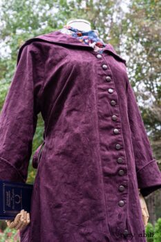 Arthur Hill Duster Coat in Honour Floral Stretch Weave; Arthur Hill Shirt in Liberty Soft Ribbed Knit; Fitz Frock in Independence Cottage Garden Weave; Blanchefleur Sash in Independence Cottage Garden Weave. Location: Inside Eleanor's flower garden. Our Independence Cottage Garden Weave was inspired by it. Eleanor Roosevelt National Historic Site. Val-Kill, Hyde Park, New York.