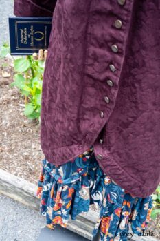 Arthur Hill Duster Coat in Honour Floral Stretch Weave; Arthur Hill Shirt in Liberty Soft Ribbed Knit; Fitz Frock in Independence Cottage Garden Weave; Blanchefleur Sash in Independence Cottage Garden Weave. Location: Inside Eleanor's flower garden. Our Independence Cottage Garden Weave was inspired by it. Eleanor Roosevelt National Historic Site. Val-Kill, Hyde Park, New York.