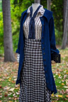 Chittister Duster Coat in Liberty Pin Tuck Twill; Pierrepont Shirt in Dignity Washed Vine Silk; Fairholme Necktie in Liberty Washed Crinkled Weave; Fairholme Skirt in Dignity Plaid Cotton. Location: Path behind house and next to pond at the Eleanor Roosevelt National Historic Site. Val-Kill, Hyde Park, New York.