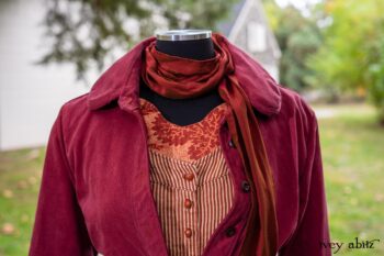 Montague Jacket in Independence Washed Cord; Blanchefleur Sash in Independence Washed Silk Chiffon; Inglenook Frock in Independence Floral Linen. Location: Path leading to loggia and Stone Cottage. Eleanor Roosevelt National Historic Site. Val-Kill, Hyde Park, New York.