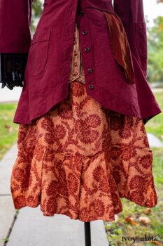 Montague Jacket in Independence Washed Cord; Blanchefleur Sash in Independence Washed Silk Chiffon; Inglenook Frock in Independence Floral Linen. Location: Path leading to loggia and Stone Cottage. Eleanor Roosevelt National Historic Site. Val-Kill, Hyde Park, New York.