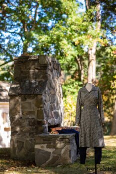 Pierrepont Shirt in Dignity Washed Vine Weave; Montague Trousers in Liberty Pin Tuck Twill; Chittister Duster Coat in Liberty Pin Tuck Twill (draped on stone fireplace). Location: Stone grill where Eleanor would serve hotdogs to dignitaries (she served hotdogs to King George of England up the hill from this location), family, and friends. Eleanor Roosevelt National Historic Site. Val-Kill, Hyde Park, New York.