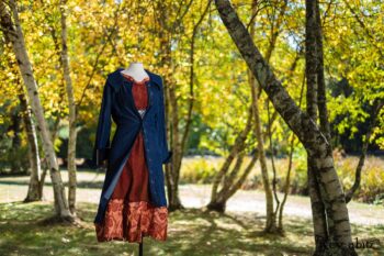 Chittister Duster Coat in Liberty Pin Tuck Twill, Nook Frock in Independence Washed Silk Chiffon; Inglenook Frock in Independence Floral Linen; Blanchefleur Sash in Independence Floral And Vine Weave. Location: Under the birch trees next to pond where Eleanor hosted many picnics from local school children to world dignitaries. Eleanor Roosevelt National Historic Site. Val-Kill, Hyde Park, New York.