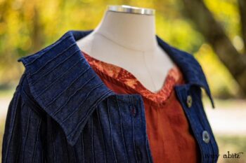 Chittister Duster Coat in Liberty Pin Tuck Twill, Nook Frock in Independence Washed Silk Chiffon; Inglenook Frock in Independence Floral Linen; Blanchefleur Sash in Independence Floral And Vine Weave. Location: Under the birch trees next to pond where Eleanor hosted many picnics from local school children to world dignitaries. Eleanor Roosevelt National Historic Site. Val-Kill, Hyde Park, New York.