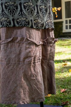 Chevallier Cardigan in Unity Soft Ribbed Knit; River Frock in Unity Art Nouveau Silk Chiffon; Hudson Frock in Peace Washed Linen. Location: Entrance to front porch of Val-Kill Cottage. Eleanor Roosevelt National Historic Site. Hyde Park, New York.