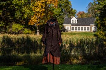 Eleanora Duster Coat in Dignity Soft Wale Corduroy; Truitt Shirt Jacket in Independence Embroidered Washed Silk; Baedeker Scarf in Unity Floral Silk Velvet; Eleanora Frock in Independence Washed Linen. Location: In front of creek and Stone Cottage at the Eleanor Roosevelt National Historic Site. Val-Kill, Hyde Park, New York.