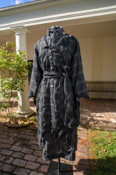 Vanetten Duster Coat in Unity Plaid Linen; Vanetten Shirt in Unity Embroidered Stitch Silk; Clotaire Sash in Unity Floral Silk Chiffon; Vanetten Frock in Unity Embroidered Loop Stripe Challis; Cilla Slip Frock in Unity Soft Ribbed Knit. Location: Loggia behind Stone Cottage at Eleanor Roosevelt National Historic Site.
