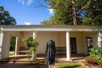 Vanetten Duster Coat in Unity Plaid Linen; Vanetten Shirt in Unity Embroidered Stitch Silk; Clotaire Sash in Unity Floral Silk Chiffon; Vanetten Frock in Unity Embroidered Loop Stripe Challis; Cilla Slip Frock in Unity Soft Ribbed Knit. Location: Loggia behind Stone Cottage at Eleanor Roosevelt National Historic Site.