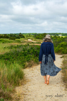 Eugenia Jacket in Seascape Melange Knit; Tilbrook Frock in Seascape Floral Linen; Porte Cochere Sash in Seascape Floral Linen. Ivey Abitz Bespoke Clothing.