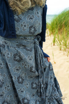 Eugenia Jacket in Seascape Melange Knit; Tilbrook Frock in Seascape Floral Linen; Porte Cochere Sash in Seascape Floral Linen. Ivey Abitz Bespoke Clothing.