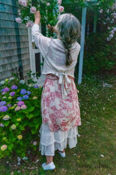 Crest Jacket in Ethereal Cream Lace Netted Knit; Crest Frock in Cape Rose Floral Voile; Blanchefleur Sash in Cape Rose Floral Voile; Heraldry Frock in Cape Rose Floral Voile. Ivey Abitz Bespoke Clothing.