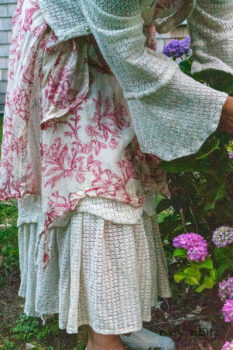 Crest Jacket in Ethereal Cream Lace Netted Knit; Crest Frock in Cape Rose Floral Voile; Blanchefleur Sash in Cape Rose Floral Voile; Heraldry Frock in Cape Rose Floral Voile. Ivey Abitz Bespoke Clothing.
