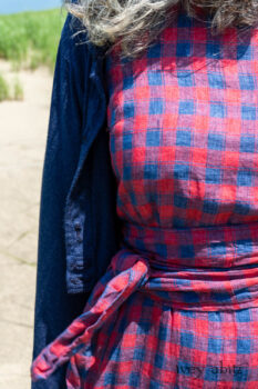 Eugenia Jacket in Seascape Melange Knit; Windrush Frock in Cape Rose and Sea Check Weave; Blanchefleur Sash in Cape Rose and Sea Check Weave. Ivey Abitz Bespoke Clothing.