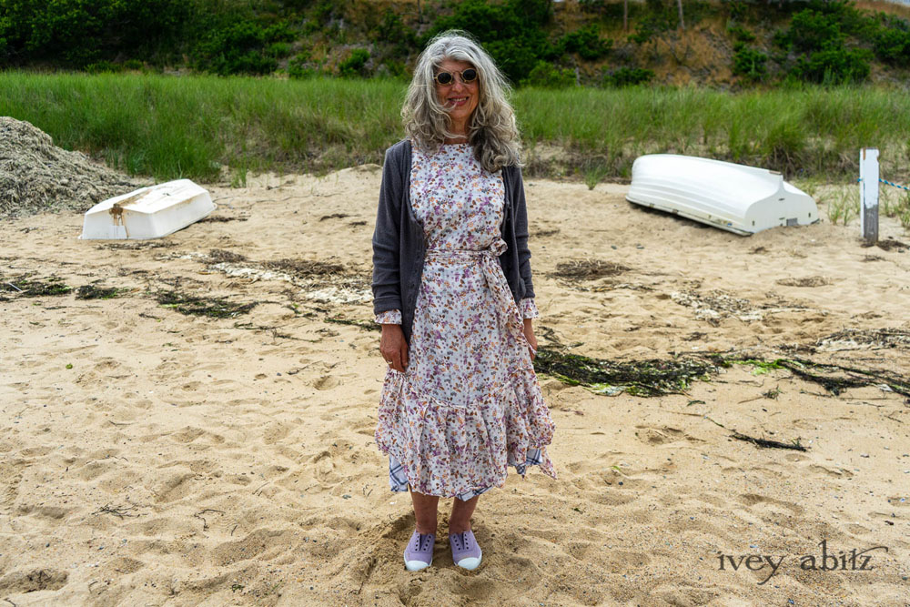 Elliot Jacket in Cape Grey Puckered Weave; Fairholme Dress in Ethereal Floral Cotton Voile; Fairholme Sash in Ethereal Floral Cotton Voile; Fairholme Frock in Plum Tree Wispy Plaid Cotton. Ivey Abitz Bespoke Clothing.