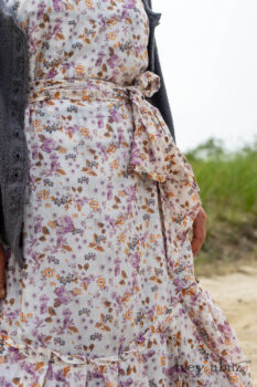 Elliot Jacket in Cape Grey Puckered Weave; Fairholme Dress in Ethereal Floral Cotton Voile; Fairholme Sash in Ethereal Floral Cotton Voile; Fairholme Frock in Plum Tree Wispy Plaid Cotton. Ivey Abitz Bespoke Clothing.