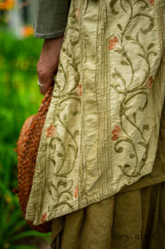 Ans Jacket in Woodlawn Melange Knit; Faudray Overlay in Sand Embroidered Pin Tuck Washed Silk; Everett Frock in Summer Land and Seagrass Washed Linen. Ivey Abitz Bespoke Clothing.