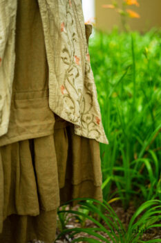 Ans Jacket in Woodlawn Melange Knit; Faudray Overlay in Sand Embroidered Pin Tuck Washed Silk; Everett Frock in Summer Land and Seagrass Washed Linen. Ivey Abitz Bespoke Clothing.