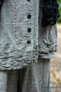 Mewland Jacket in Black Washed Crinkled Linen; Mewland Vest in Beacon Black Embroidered Plaid on Petite Stripe; Mewland Trousers in Beacon Black Embroidered Plaid on Petite Stripe. Ivey Abitz Bespoke Clothing.