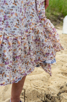 Elliot Jacket in Cape Grey Puckered Weave; Fairholme Dress in Ethereal Floral Cotton Voile; Fairholme Sash in Ethereal Floral Cotton Voile; Fairholme Frock in Plum Tree Wispy Plaid Cotton. Ivey Abitz Bespoke Clothing.