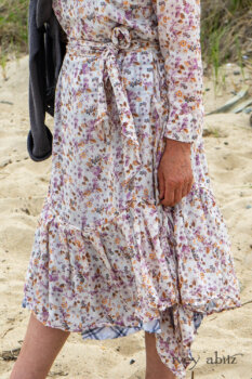 Fairholme Dress in Ethereal Floral Cotton Voile; Fairholme Sash in Ethereal Floral Cotton Voile; Fairholme Frock in Plum Tree Wispy Plaid Cotton; Elliot Jacket in Cape Grey Puckered Weave. Ivey Abitz Bespoke Clothing.