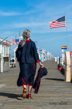 Sennen Jacket in National Seashore Washed Linen with Cape Rose Washed Linen details; Sennen Frock in National Seashore Washed Linen with Cape Rose Washed Linen detail; Limited Edition Gilbert Cardigan in National Seashore and Red Stripe Knit. Ivey Abitz Bespoke Clothing.