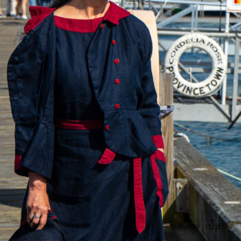 Sennen Jacket in National Seashore Washed Linen with Cape Rose Washed Linen details; Sennen Frock in National Seashore Washed Linen with Cape Rose Washed Linen detail; Limited Edition Gilbert Cardigan in National Seashore and Red Stripe Knit. Ivey Abitz Bespoke Clothing.