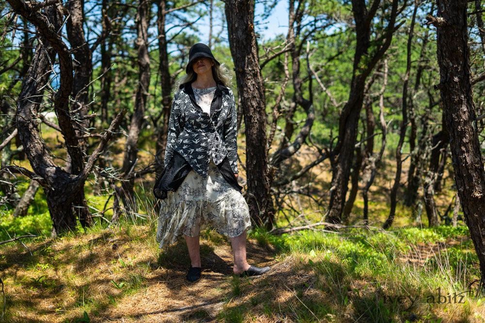 Elliot Jacket in Beacon Black Flora and Fauna Knit; Inglenook Shirt Jacket in Beacon Black Stripe Twill Silk; Fairholme Dress in Ethereal Cream and Black Floral Voile; Cilla Slip Frock in Sailcloth Soft Ribbed Knit. Ivey Abitz Bespoke Clothing.