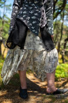 Elliot Jacket in Beacon Black Flora and Fauna Knit; Inglenook Shirt Jacket in Beacon Black Stripe Twill Silk; Fairholme Dress in Ethereal Cream and Black Floral Voile; Cilla Slip Frock in Sailcloth Soft Ribbed Knit. Ivey Abitz Bespoke Clothing.