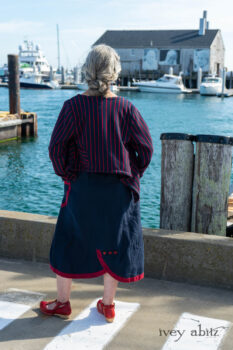 Limited Edition Gilbert Cardigan in National Seashore and Red Stripe Knit; Sennen Frock in National Seashore Washed Linen with Cape Rose Washed Linen details. Ivey Abitz Bespoke Clothing.