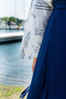 Highlands Shirt in National Seashore Sail Cotton; Clotaire Sash in National Seashore Floral Silk Chiffon; Cilla Camisole in Sailcloth Soft Ribbed Knit; Highlands Skirt in National Seashore Washed Ribbed Knit; Pierrepont Breeches-Leggings in National Seashore Washed Ribbed Knit. Ivey Abitz Bespoke Clothing.