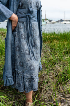 Tilbrook Duster Coat in Seascape Woven Linen; Tilbrook Frock in Seascape Floral Linen; Porte Cochere Sash in Estuary Herringbone Twill. Ivey Abitz Bespoke Clothing.