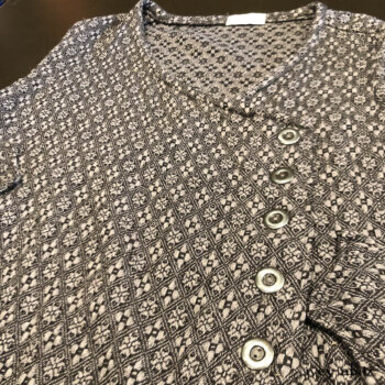 Detail of the Camille Frock. Adorned with vintage metal buttons from Italy.