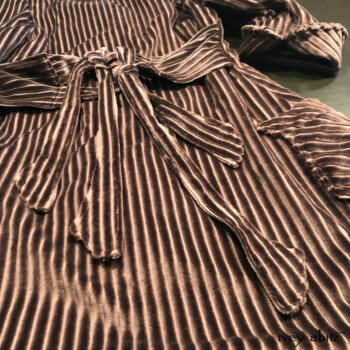 Our signature back tabs and ties as an option on the Eleanora Duster Coat.