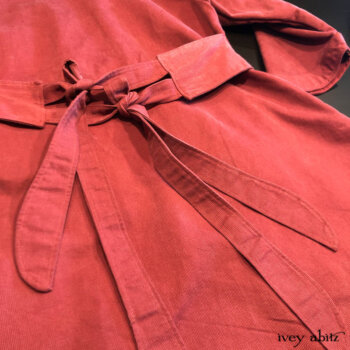 Back detail of the Montague Jacket, features our signature tab and two tie detail.